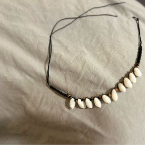black cowrie shell necklace